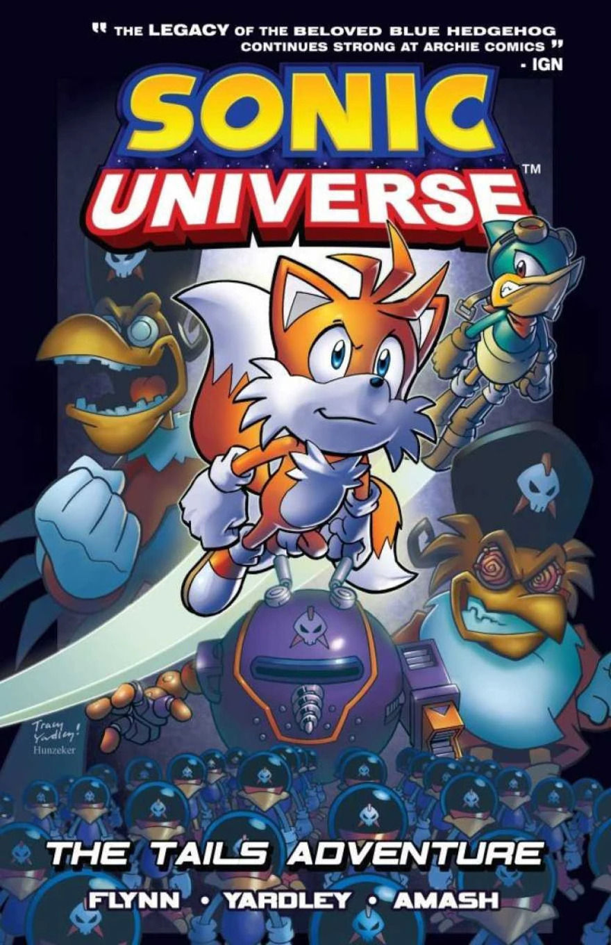 Tails firing in midair, surrounded by a squadron of pirate birds and robotic enemies.