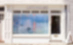 Graphic roller shade on an art studio window.