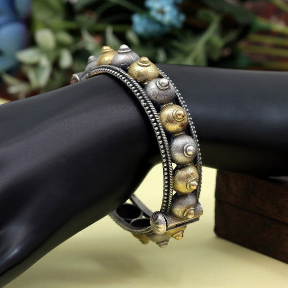 Designer bracelet with gold and silver beads