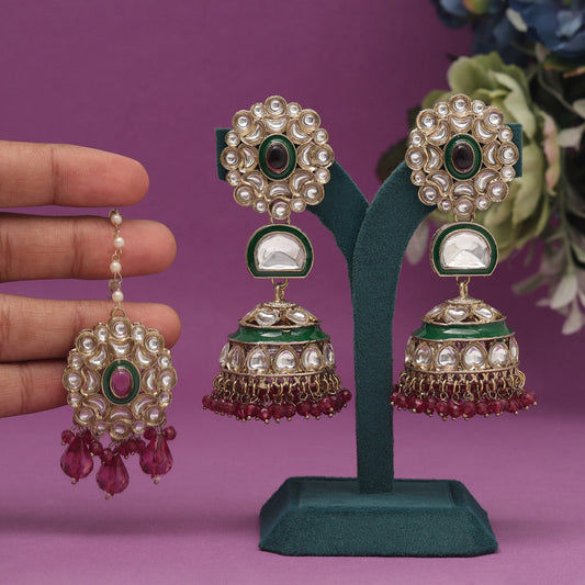 Elegant green and pink jeweled earrings and maang tikka