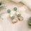 Thumbnail: Elegant green and white gemstone earrings