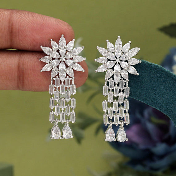 Elegant floral diamond earrings with dangling accents