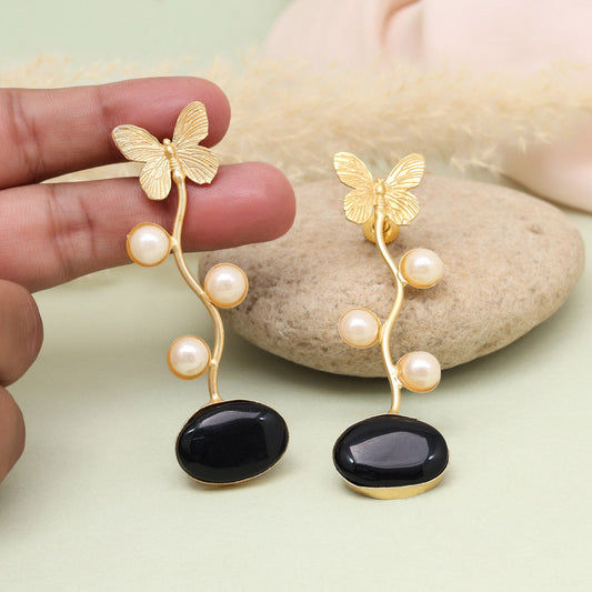 Elegant gold butterfly earrings with pearls and black onyx