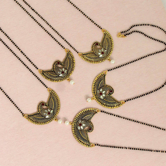 Antique gold necklaces with pearl accents