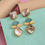 Thumbnail: Elegant shell and blue gemstone earrings