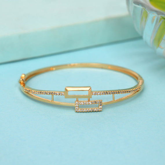 Elegant gold bangle with diamond accents