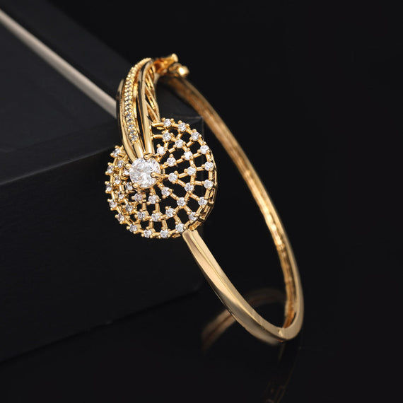 Elegant gold bracelet with sparkling white stones