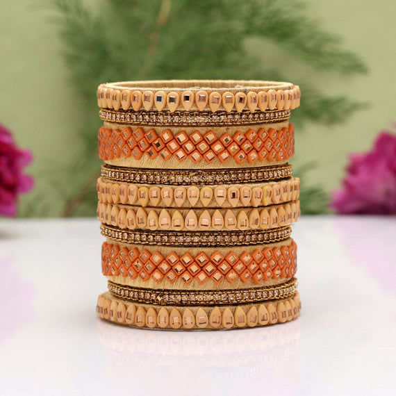 Orange and gold beaded bangles