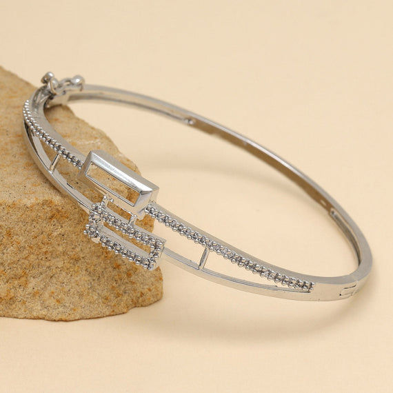 Elegant silver bangle bracelet with geometric design