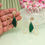 Thumbnail: Green gemstone butterfly earrings