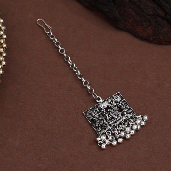 Oxidized silver maang tikka with intricate detailing