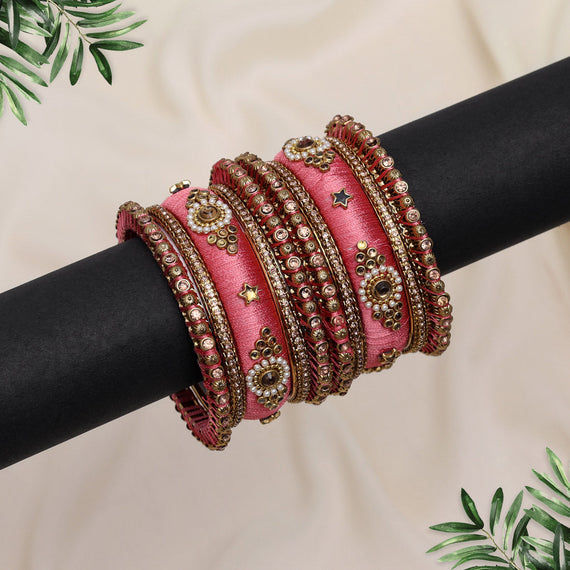 Pink silk thread bangles with embellishments