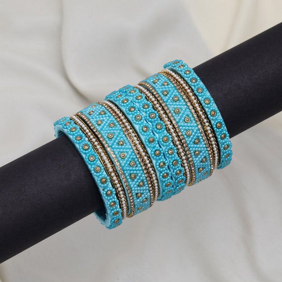 Teal and silver bangles