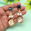Thumbnail: Elegant gold earrings with pearls and stones