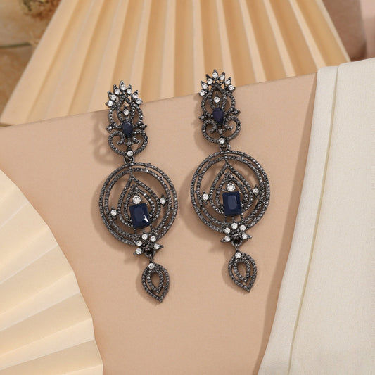 Elegant dark earrings with blue gems