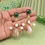 Thumbnail: Elegant green gemstone and pearl earrings