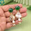 Thumbnail: Elegant green and pearl drop earrings