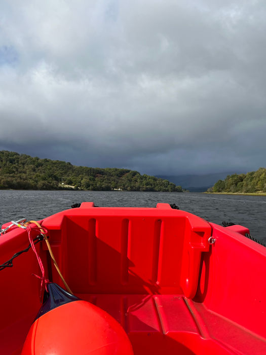 Safety boat deck and flotation equipment ready for deployment.