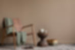 Aesthetics composition of living room interior with copy space, stylish armchair, green pl