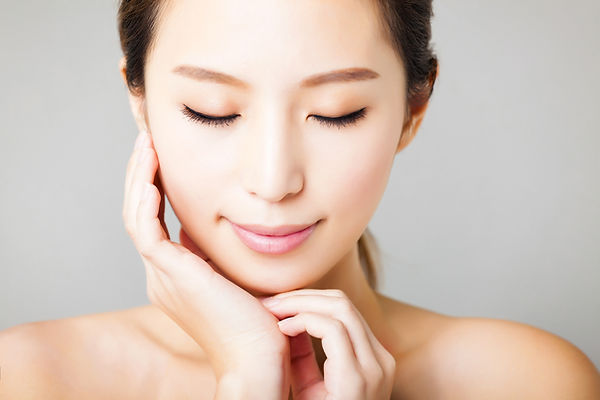 Closeup Smiling Young Beautiful Asian Woman Face.jpg