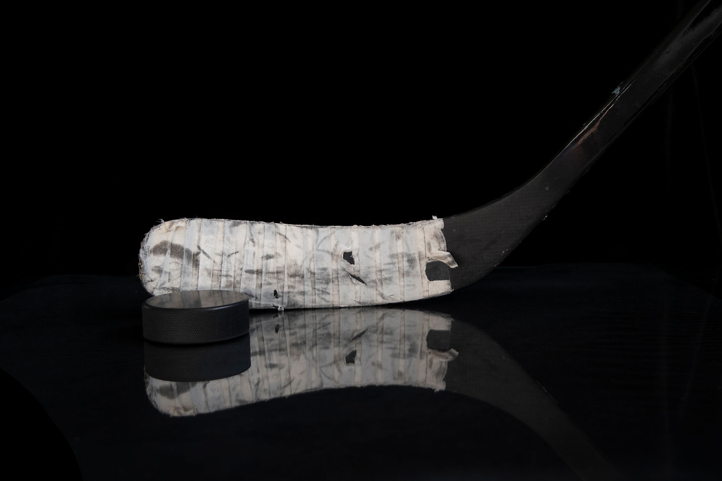 hockey stick and puck