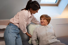 female-nurse-taking-care-elderly-person