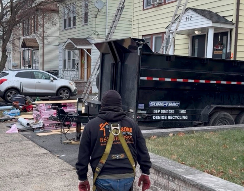 Emergency roof repair crew at work on a home in the Westfield NJ service area
