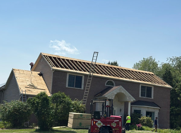 Shingle installation on a roof replacement job in North Jersey