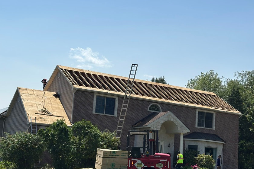 Plank decking exposed during a tear-off on a roof replacement near Bloomfield NJ