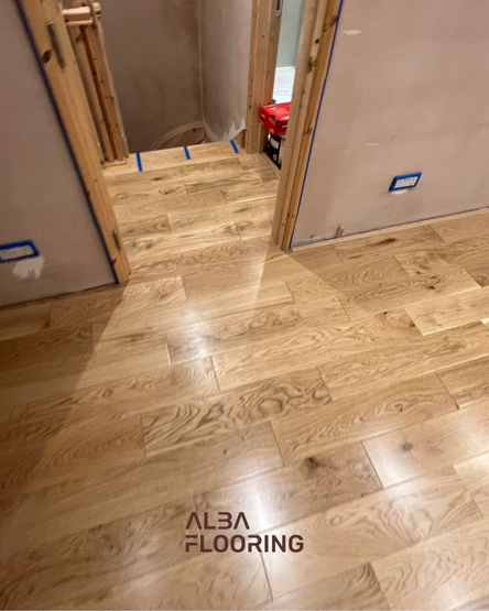 Floating engineered wood floor with natural grain finish in loft room Croydon
