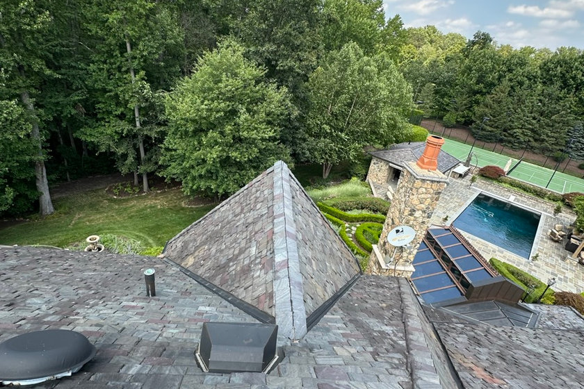 Repairing the pitched-to-flat roof transition on a Paramus NJ home