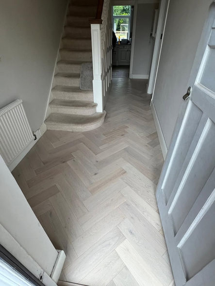 White staircase and doors by Alba Flooring.