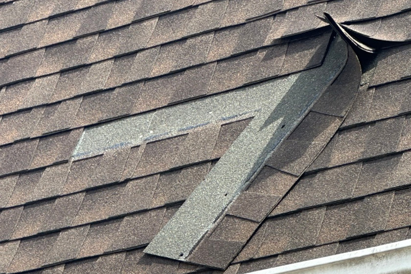 Storm damage roof repair documented for an insurance claim near Washington NJ