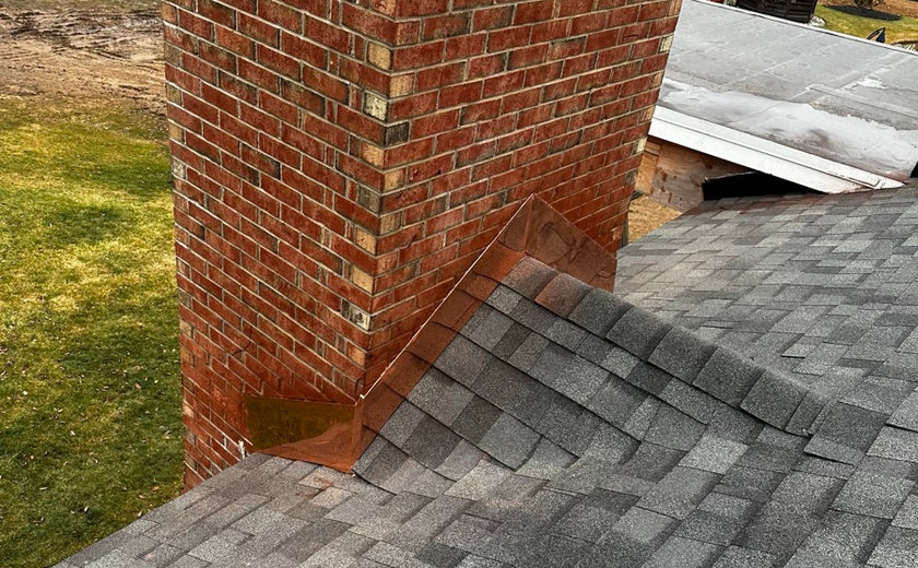 Completed chimney rebuild on a Passaic NJ roof