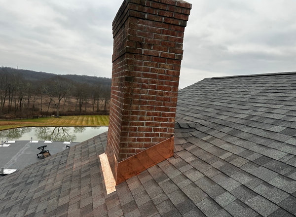 Chimney masonry and flashing repair on a Totowa NJ roof
