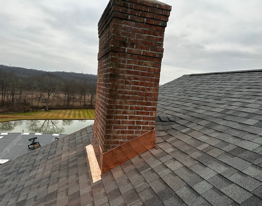 Chimney masonry and flashing work on a Fair Lawn NJ roof