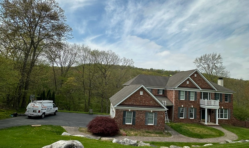 Finished roof replacement on a Garfield NJ home by Four Seasons Roofing and Construction