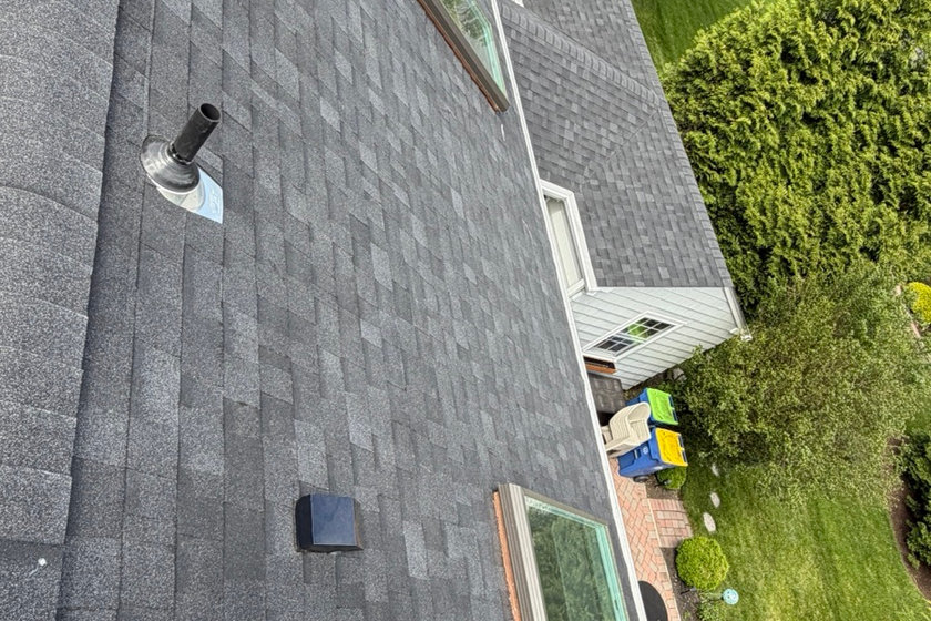 Architectural shingle roof replacement installed for high wind exposure