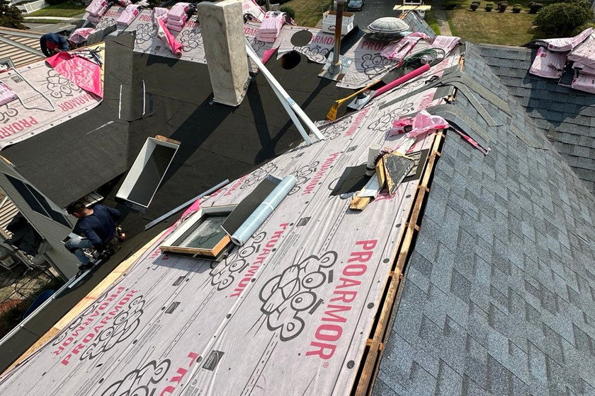 Plank decking exposed during a tear-off on a roof replacement near Wallington NJ
