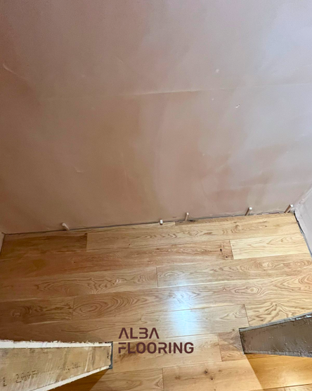 Engineered wood flooring laid across loft landing area in Croydon home