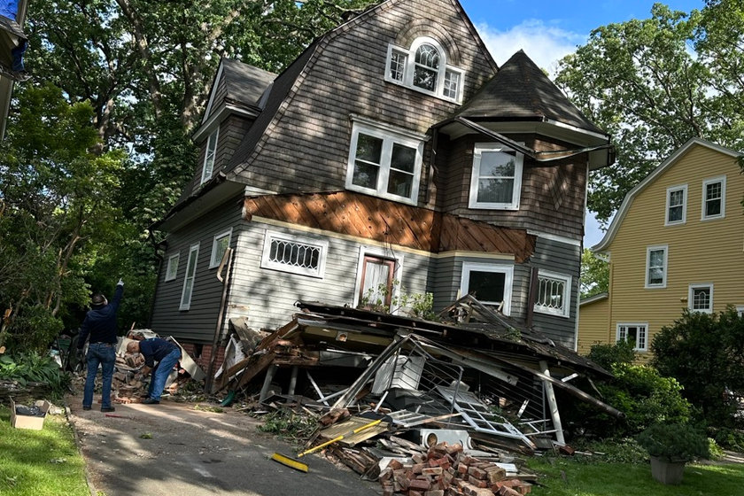 Storm damage where water got behind failed siding on a North Jersey home