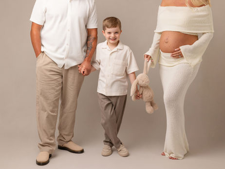 Expectant couple holding hands maternity portrait in Loughborough