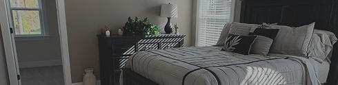 Tidy and freshly cleaned bedroom representing one-time cleaning service