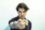 Man pointing at the reader
