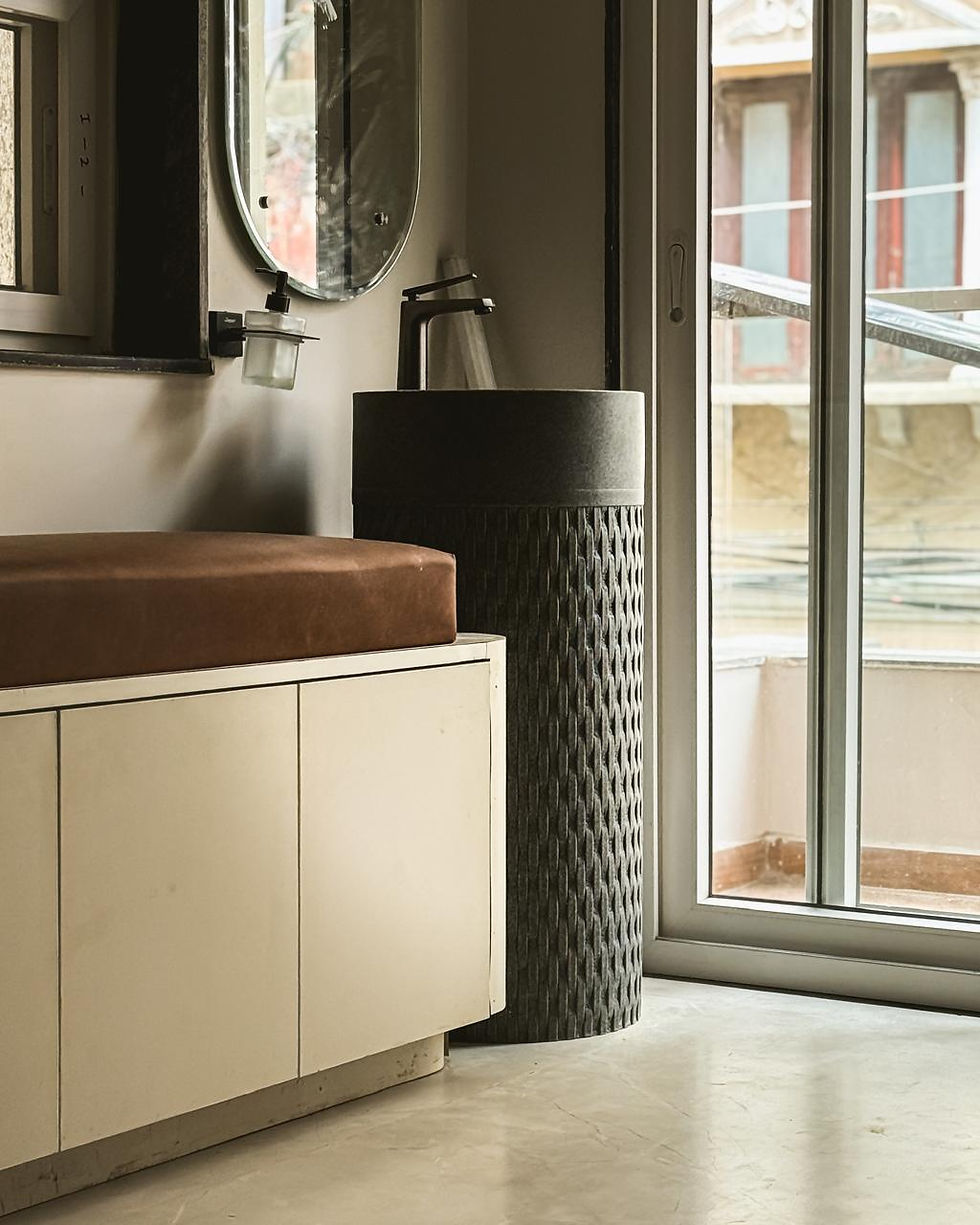grey artistic pedestal and handwash