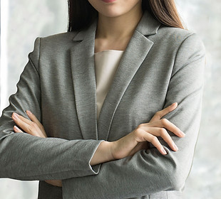 Woman in Grey Suit