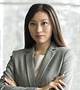 Woman in Grey Suit