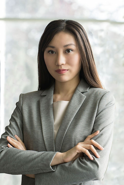 Woman in Grey Suit