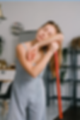 Tired lady leaning on a broom handle