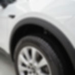 White car front wheel and fender